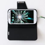 Émilie Brout & Maxime Marion. <em>Return of the Broken Screens (Samsung Galaxy S3 II)</em>, 2016. Broken found smart-phone, video, 5 1/2 x 2 3/4 inches (14 x 7 cm)