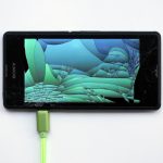 Émilie Brout & Maxime Marion. <em>Return of the Broken Screens (Sony Xperia E3)</em>, 2016. Broken found smart-phone, video, 5 1/2 x 2 3/4 inches (14 x 7 cm)