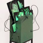 Émilie Brout & Maxime Marion. <em> Oasis Max Life</em>, 2016. Tablet computers in floral foam, steel pedestal, 59 x 15 3/4 x 15 3/4 inches (150 x 40 x 40 cm) Detail