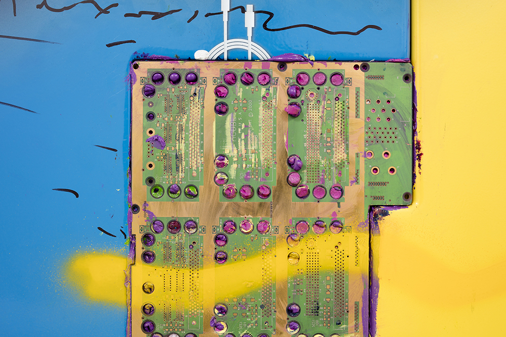 <em>let’s build</em>, 2017. UV print, spray paint, duct tape, ink, circuit board, bag of nuts and oil on powder coated steel, 49 x 39 x 3 inches. Detail