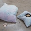 Lila de Magalhaes and Roni Shneior. <em>Close the Door Behind You</em>, 2017. Clay, resin, acrylic, dyed fabric, silver thread, hay, wig, and cigarettes, 16 x 80 x 72 inches thumbnail
