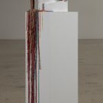 Addie Wagenknecht. <em>Waiting for Mr. Right</em>, 2017. Polystyrene, silicone, alabaster, drip candles and artificial flowers, 47 x 12 1/2 x 11 inches