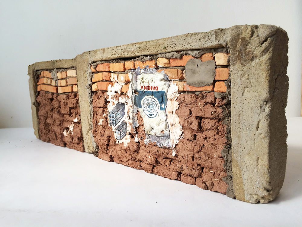 Ximena Garrido-Lecca. <em>Paredes de Progreso: Andino / Walls of Progress: Andean</em>, 2013. Mud, straw, cement, fired bricks and acrylic, 6 5/16 x 19 1/2 x 1 9/16 inches