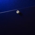 Joshua Saunders. <em>Purple Stack 1</em>, 2017. Enamel on aluminum, stainless steel, 60 x 40 x 1 1/2 inches. Detail