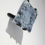 <em>Denim #5</em>, 2017. Vacuum packed jeans, tablet wall mount, 9 1/2 x 10 x 5 inches