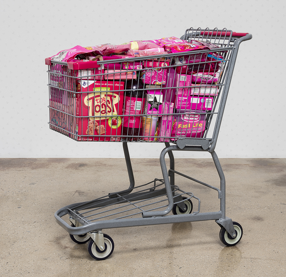Adriana Martinez. <em>CMYK</em>, 2017. Metal shopping carts, plastic, spray paint and packed groceries, 41 x 25 x 32 inches (104.1 x 63.5 x 81.3 cm)