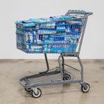Adriana Martinez. <em>CMYK</em>, 2017. Metal shopping carts, plastic, spray paint and packed groceries, 41 x 25 x 32 inches (104.1 x 63.5 x 81.3 cm)