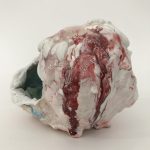Brian Rochefort. <em>Skull (red, white, black)</em>,  2017. Terra cotta, glaze and glass fragments, 7 x 5 x 7 inches (17.8 x 12.7 x 17.8 cm)