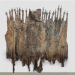 Eddie Rodolfo Aparicio. <em>Aquellos Que Apuntan Con El Dedo Medio (11th and Union Streets, Los Angeles, California)</em>, 2017. Rubber, sulfur, resin, tree and paint residue on cotton, 102 x 180 x 6 inches (259.1 x 457.2 x 15.2 cm)