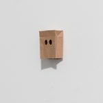 Nick Doyle. <em>Shame</em>, 2019. Re-purposed paper bag, pva adhesive, 1 3/4 x 1 1/4 x 1/2 inches  (4.4 x 3.2 x 1.3 cm)