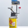 Nick Doyle. <em>Executive Toy: The Lonely Road</em>, 2019. Concrete, vintage tin, steel, brass, arcade game joystick, plywood, hardware, sandpaper, flashe, silica bronze, paper bag, skateboard bearing, denim, paper, cotton and phonograph motor, 28 1/2 x 11 1/2 x 7 inches (72.4 x 29.2 x 17.8 cm) thumbnail