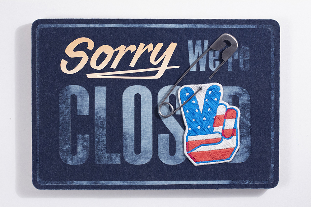 Nick Doyle. <em>Sorry We're Closed</em>, 2019, Steel, embroidery, flashe and denim on plywood, 16 1/2 x 24 x 2 inches (41.9 x 61 x 5.1 cm)