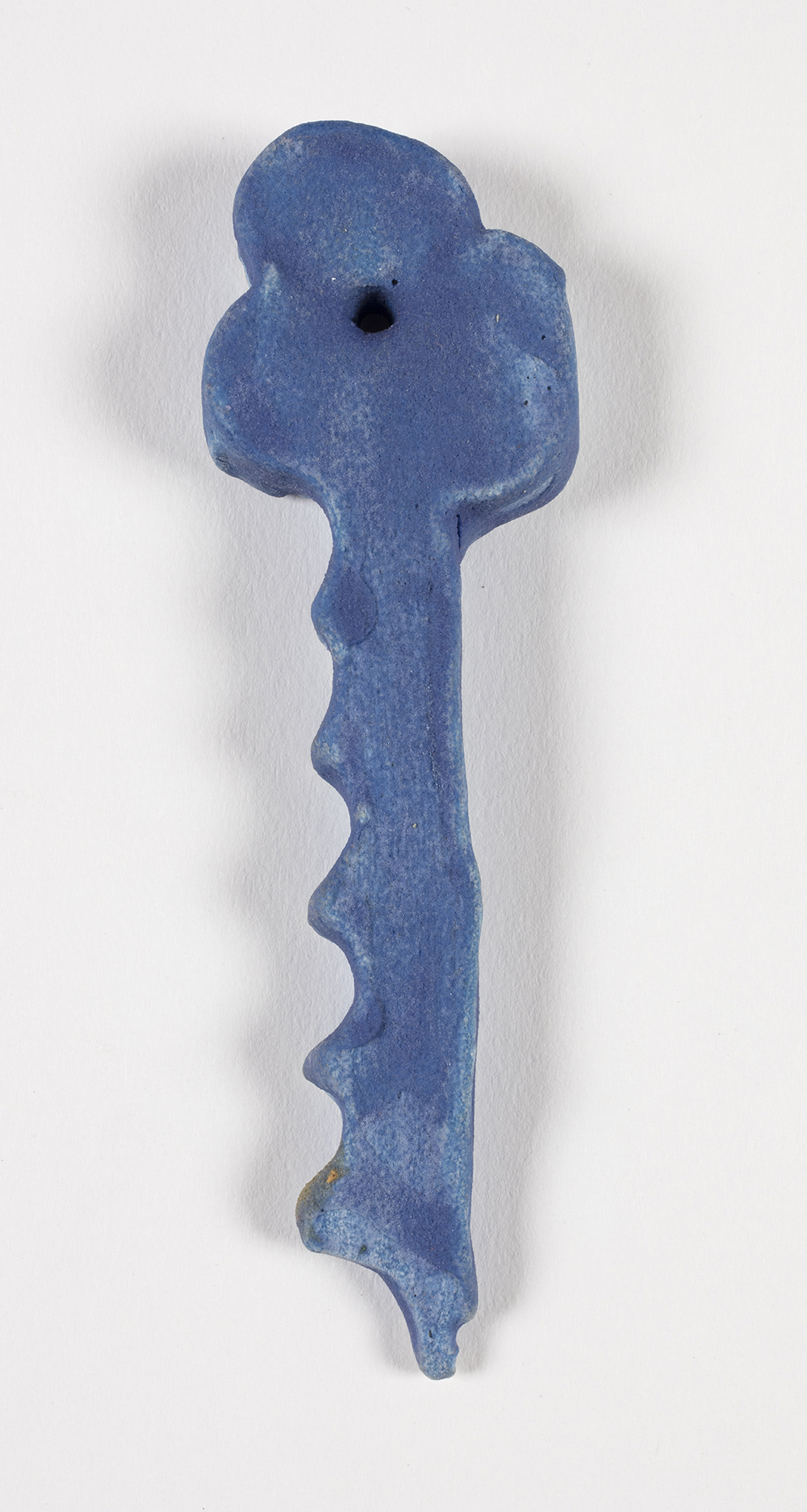 Kevin McNamee-Tweed.<em> Key (Irish Blue)</em>, 2019. Glazed ceramic, 4 x 1 inches (10.2 x 2.5 cm)