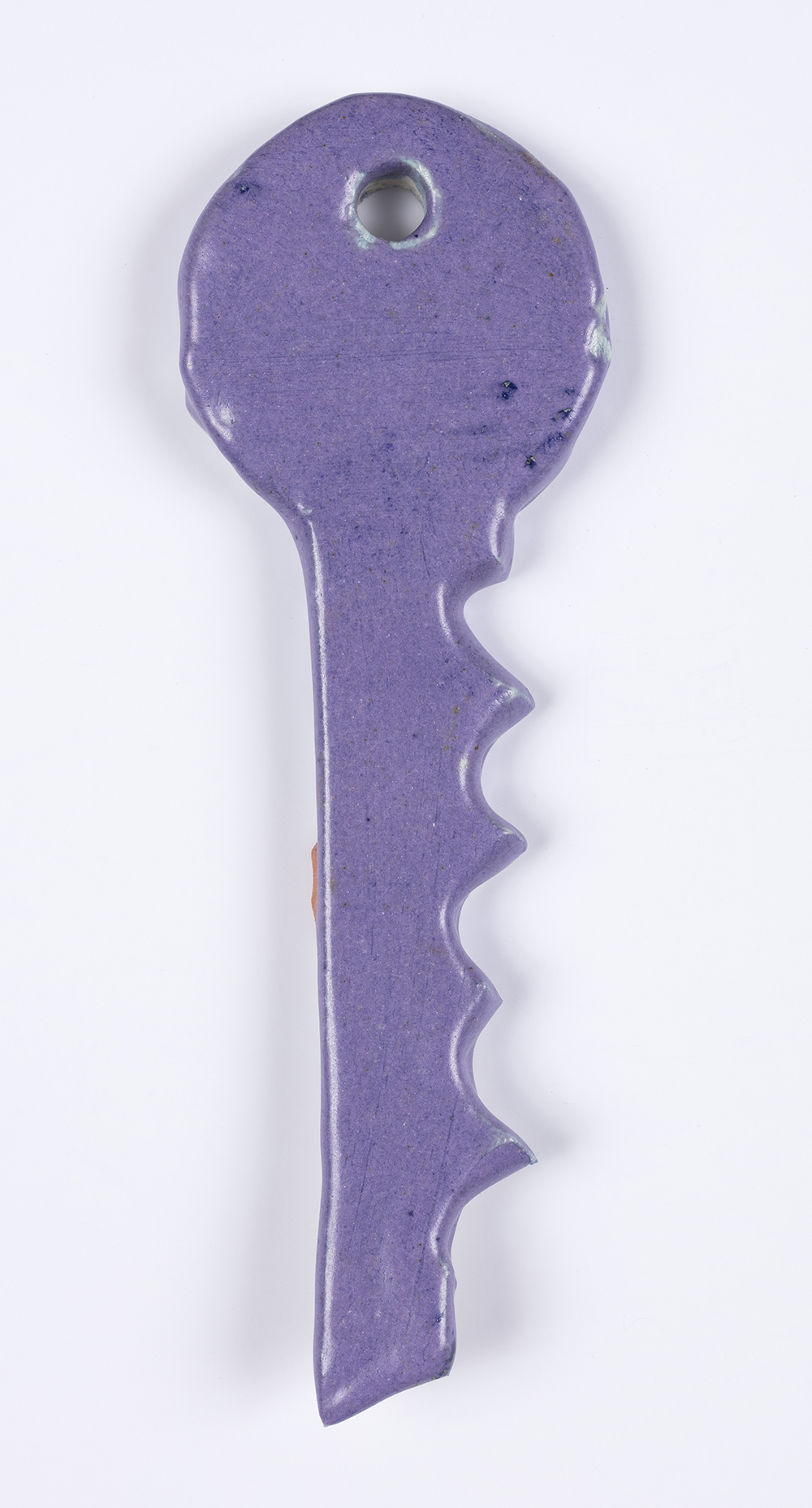 Kevin McNamee-Tweed.<em> Key (Lily)</em>, 2019. Glazed ceramic, 5 x 1 3/4 inches (12.7 x 4.4 cm)