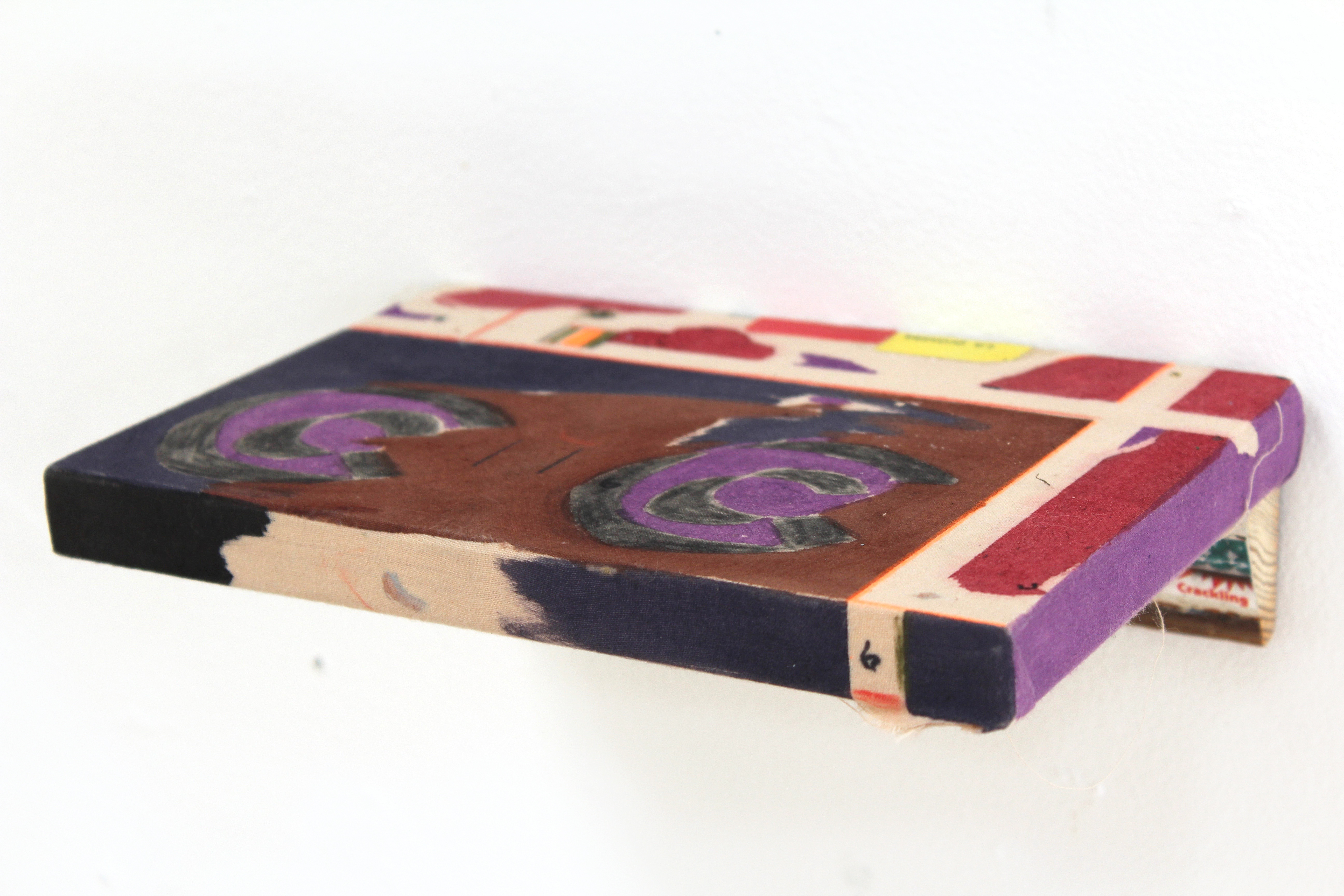 Kevin McNamee-Tweed.<em> CC Shelf</em>, 2019. Ink on muslin mounted to wood with affixed sticker and newsprint, 2 1/2 x 9 x 6 inches (6.4 x 22.9 x 15.2 cm)