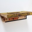 Kevin McNamee-Tweed.<em> Folding Shelf</em>, 2019. Ink on wood with affixed yardstick and found wood, 2 1/4 x 8 1/2 x 3 3/4 inches (5.7 x 21.6 x 9.5 cm) thumbnail