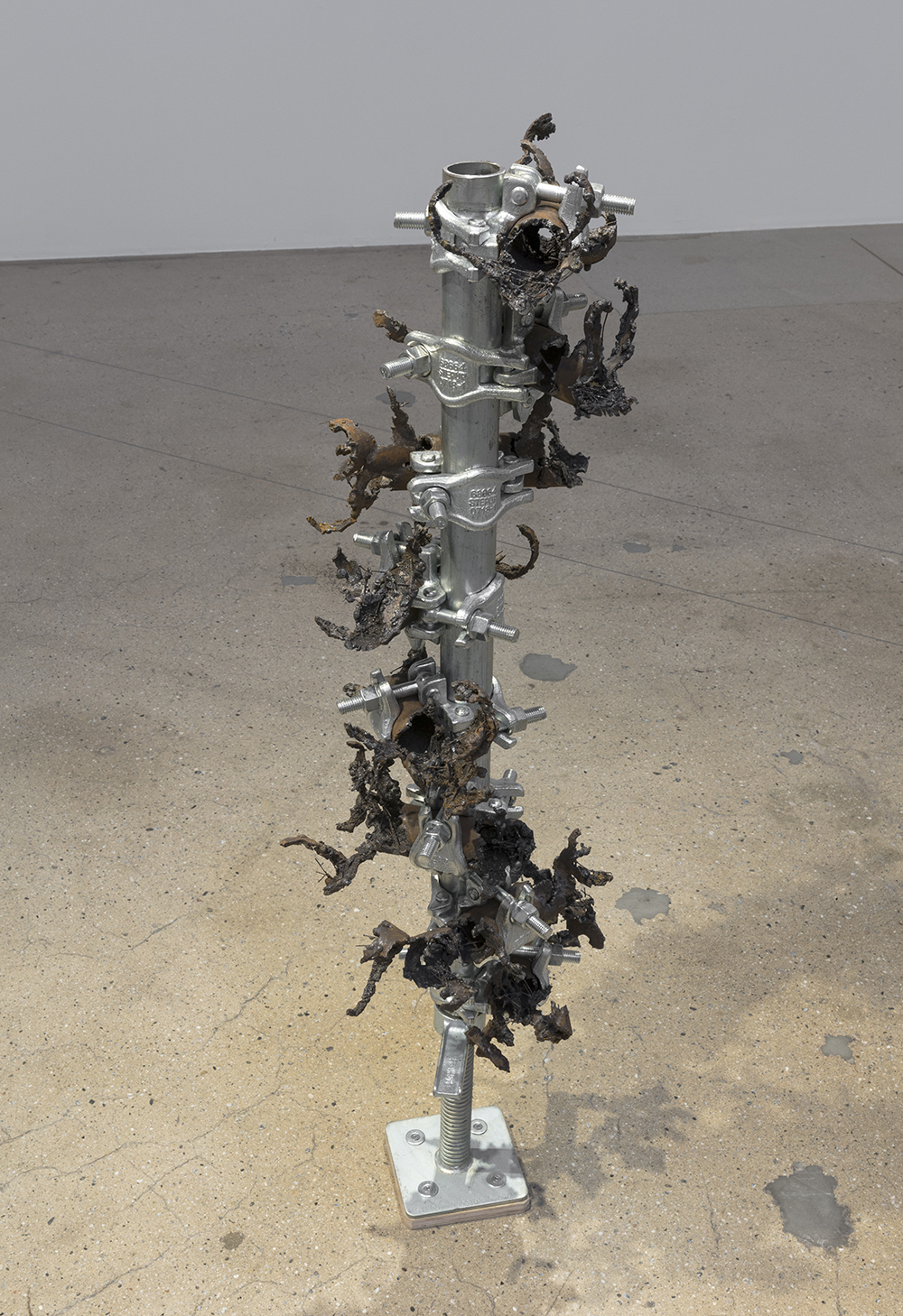 Luciana Lamothe. <em> Burning Inside</em>, 2019. Iron pipes and clamps, 45 x 12 x 12 inches (114.3 x 30.5 x 30.5 cm)