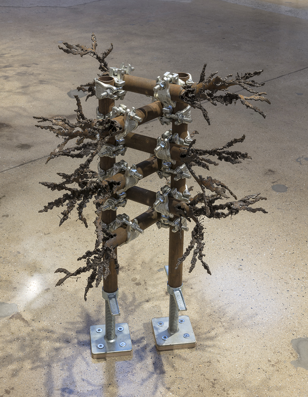 Luciana Lamothe. <em> Straight Burn, 1</em>, 2019. Iron pipes and clamps, 42 x 28 x 28 inches (106.7 x 71.1 x 71.1 cm)