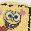 Hannah Epstein. <em>Stretch Bob Square Pants</em>, 2019. Wool, acrylic, burlap, polyfill and found Sponge Bob body parts, 47 x 14 x 4 inches (119.4 x 35.6 x 10.2 cm) Detail thumbnail