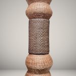 Eugenia Mendoza. <em>Basket Genealogy I</em>, 2020. Wicker and bronze, 118 1/8 x 31 1/2 x 31 1/2 inches (300 x 80 x 80 cm)