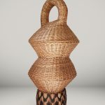 Eugenia Mendoza. <em>Basket Genealogy II</em>, 2020. Wicker and bronze, 63 x 27 1/2 x 27 1/2 inches (160 x 70 x 70 cm)