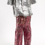 Dickens Otieno. <em>School Uniform (Untitled School)</em>, 2022. Shredded aluminum cans woven on galvanized steel mesh, 42 x 18 1/2 x 10 1/2 inches (106.7 x 47 x 26.7 cm)