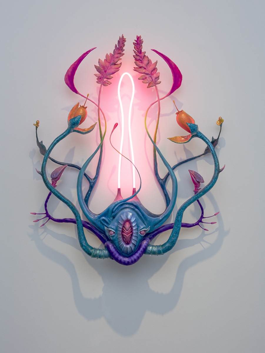 Vincent Cy Chen. <em>The Vessel</em>, 2023. Neon, acrylic gouache, feather, pigmented silicone, fiberglass, tinted resin, resin clay, epoxy, foam, steel, wood, hardware, and mineral spirits, 50 x 43 x 12 inches (127 x 109.2 x 30.5 cm)
