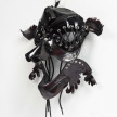 Jakob Rowlinson. <em>Mask XII (Appellant Fawn)</em>, 2023. Patent leather, shoelaces, eyelets, split pins and clip rings, 12 x 15 x 6 3/4 inches (30.5 x 38.1 x 17.1 cm) thumbnail