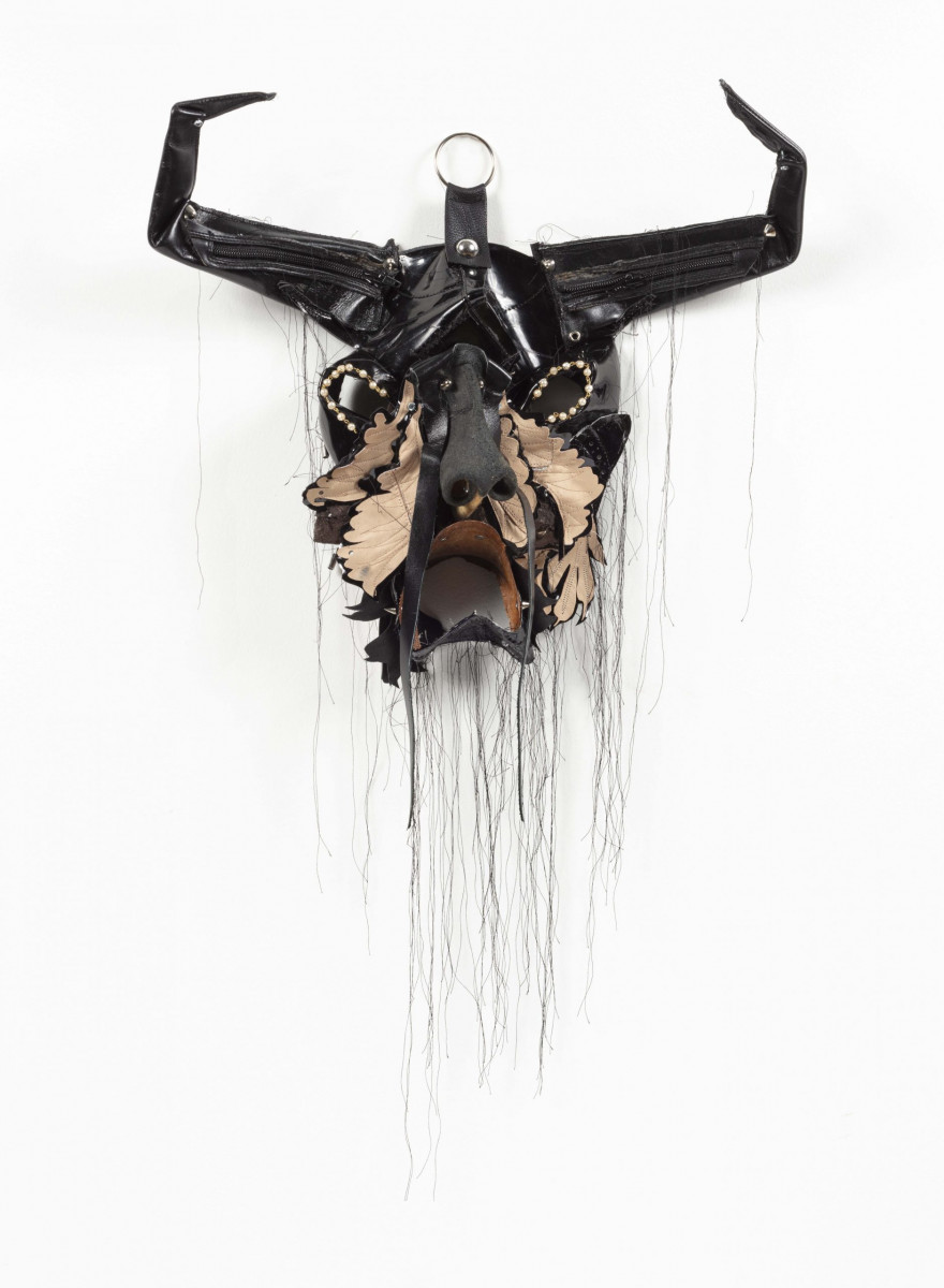 Jakob Rowlinson. <em>Mask XIV</em>, 2023. Leather boots, zips, faux pearl necklace, faux leather, clip rings, screws and cotton thread, 23 x 18 x 4 3/4 inches (58.4 x 45.7 x 12.1 cm)