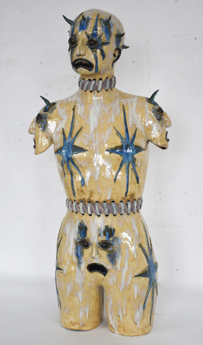 Becky Tucker. <em>Mimic</em>, 2024. Glazed stoneware, strappings dyed with indigo leaf, 38 1/4 x 17 3/4 x 11 inches (97 x 45 x 28 cm)